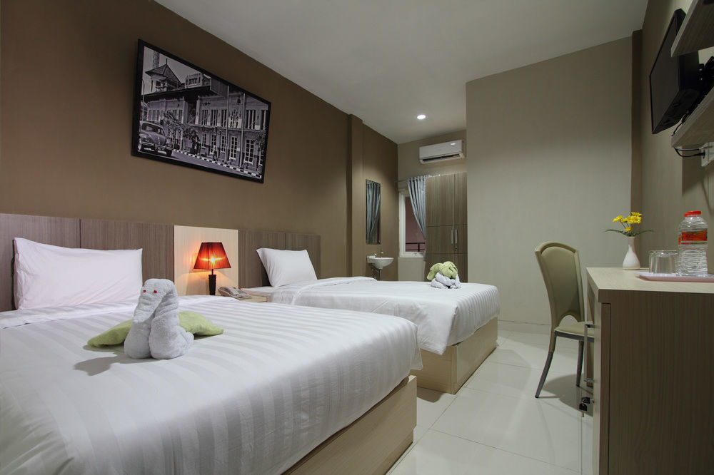 Oyo Flagship 3726 Tembok Batu Residence Tugu Exterior foto
